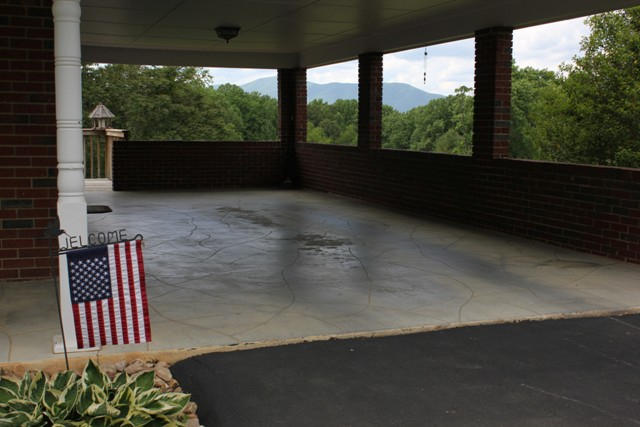 65 Iron Ridge Road Rocky Mount, VA 24151 - Photo 33 of 33 a view of a porch with furniture and floor to ceiling window