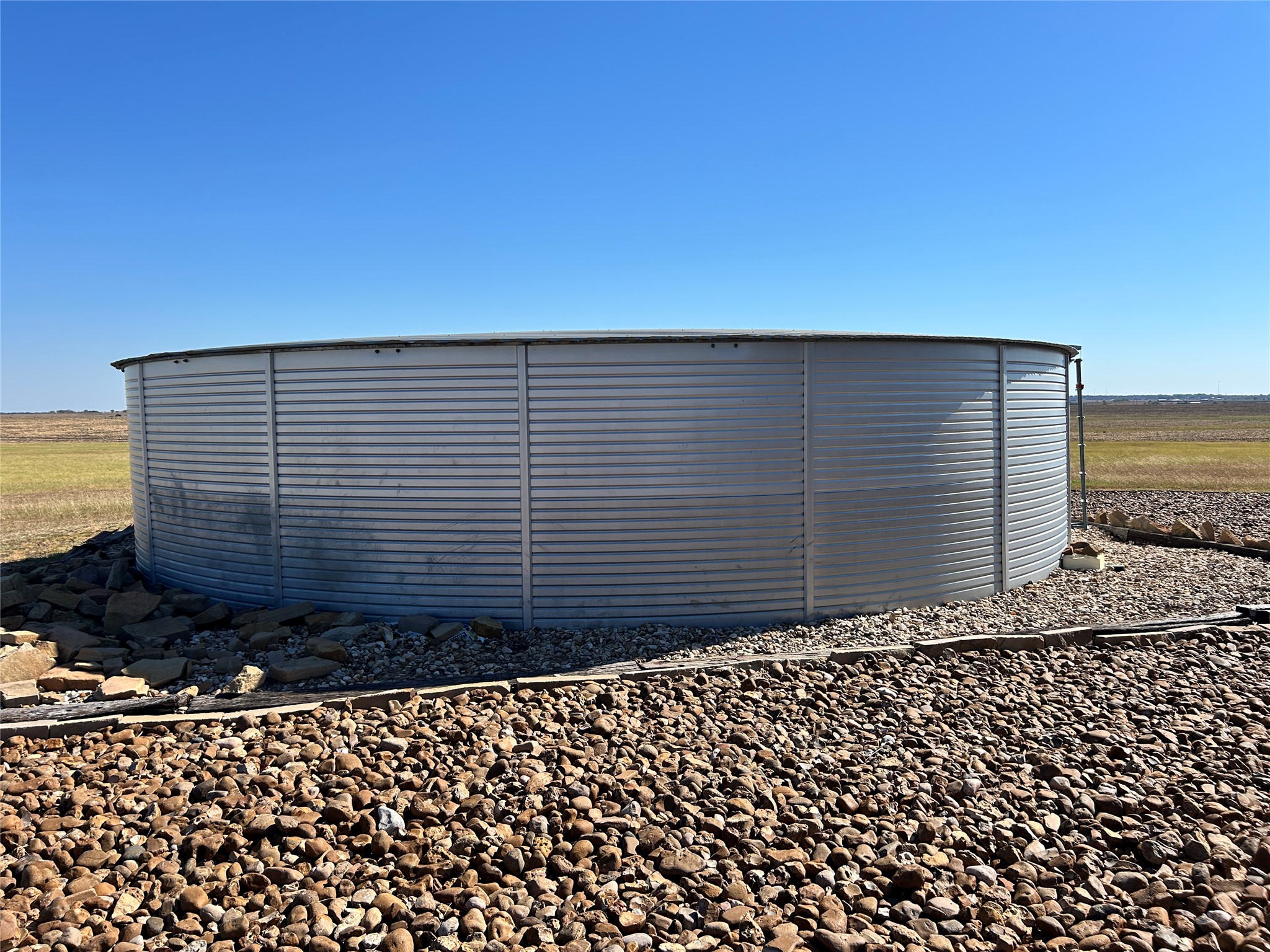 14502 Lund - Carlson Road Coupland, TX 78615 - Photo 38 of 40 52000 Gallon rainwater collection station full and operational