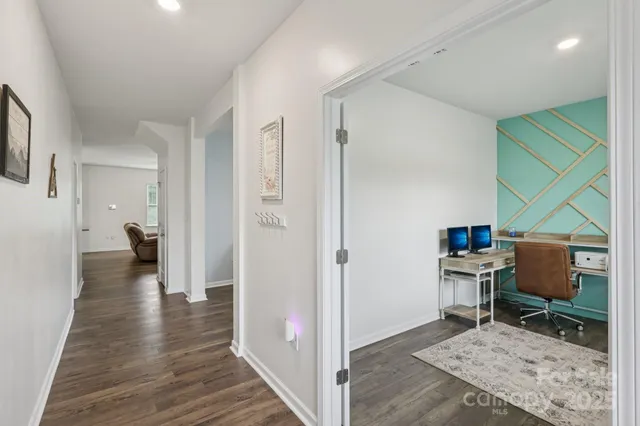 a room with furniture and a window