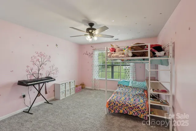 a room with furniture and a chandelier