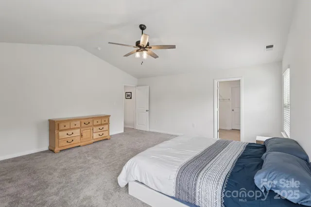 a bathroom with a granite countertop sink mirror and double