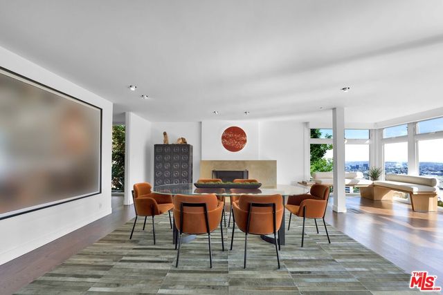 a kitchen with stainless steel appliances granite countertop a stove and a sink