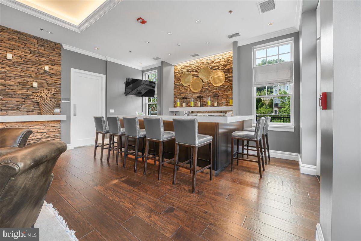 8111 River Road, Unit 131 Bethesda, MD 20817 - Photo 43 of 59 Bar area has a catering kitchen behind door