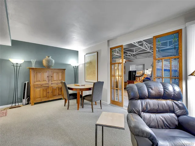 a workspace with furniture and window