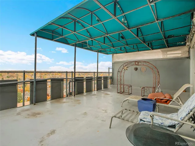 a view of a swimming pool with a chair