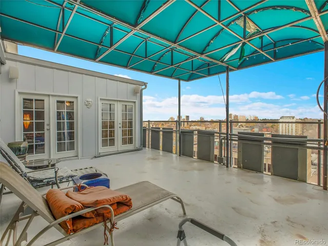 a backyard of a house with seating space
