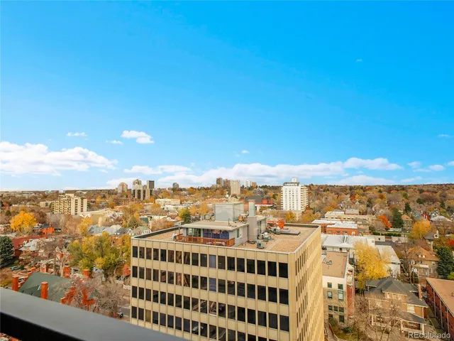 a view of a city with tall buildings