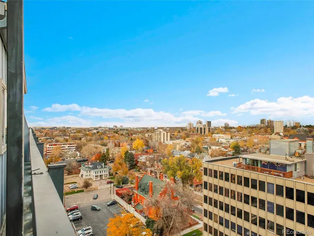a view of a city with tall buildings
