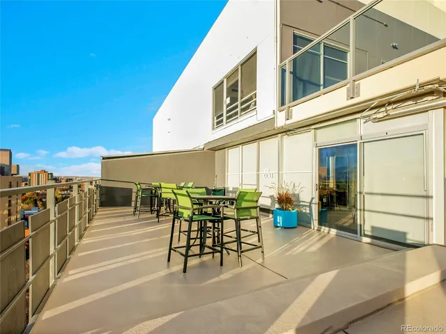 an outdoor space with furniture