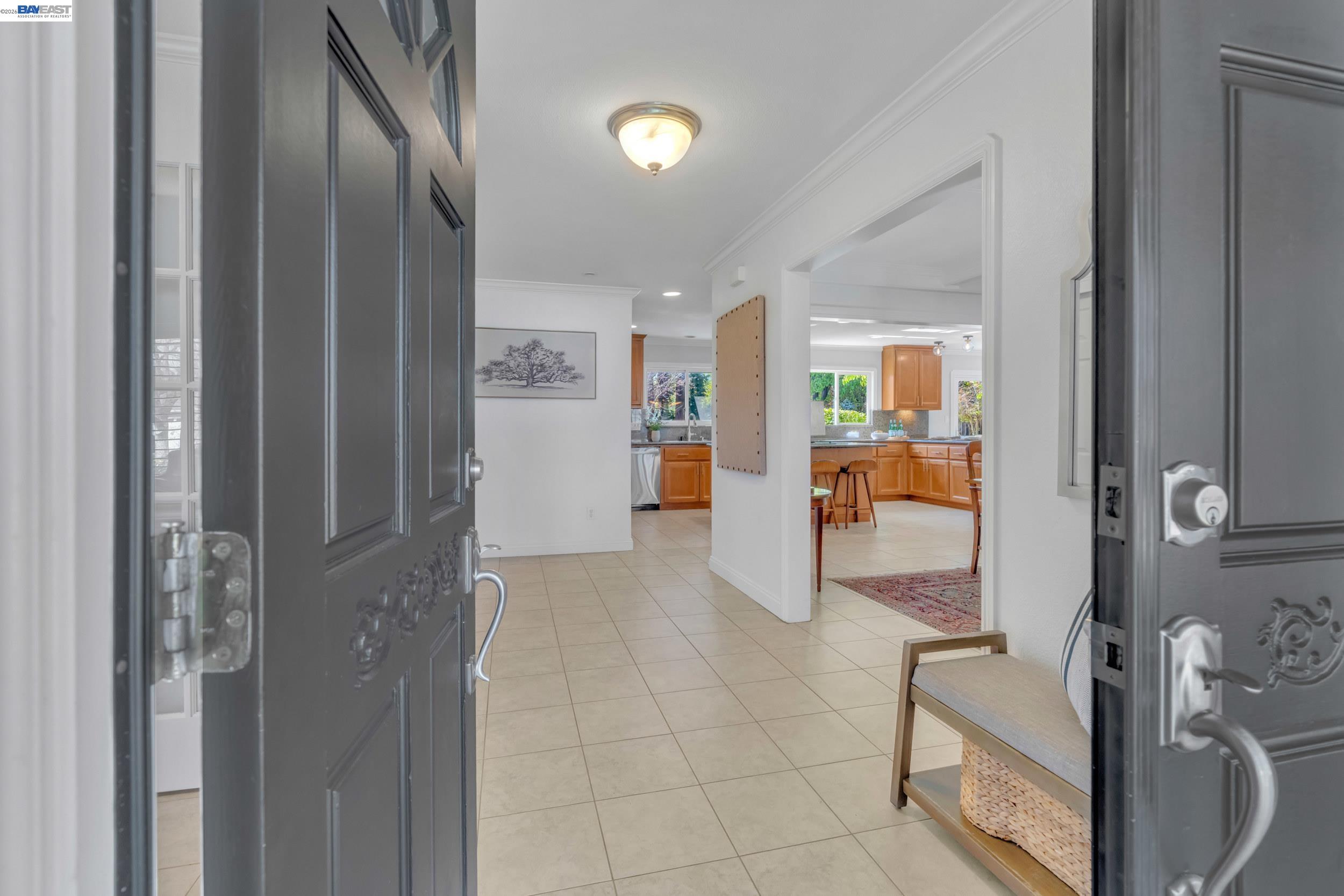 2070 Raven Road Pleasanton, CA 94566 - Photo 4 of 34 a view of a hallway with bathroom and glass door