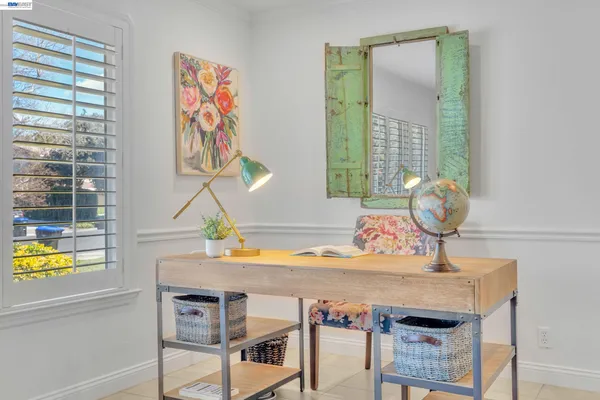 a view of a workspace with furniture