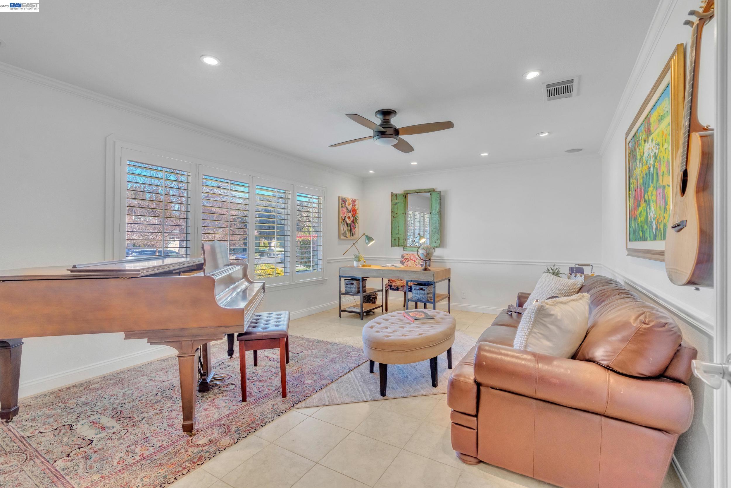 2070 Raven Road Pleasanton, CA 94566 - Photo 6 of 34 a living room with furniture and a large window