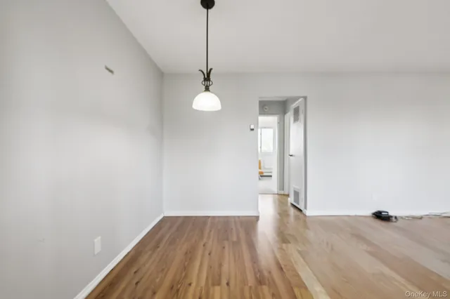 a kitchen with stainless steel appliances a stove and a refrigerator