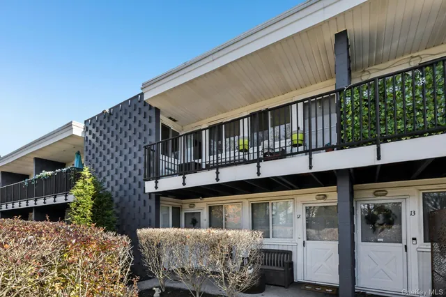 a front view of a house with balcony