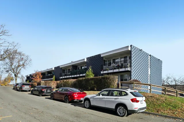 a car parked in front of a house