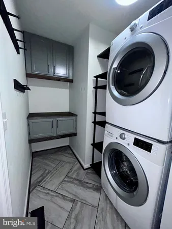 a view of backyard with deck and wooden floor