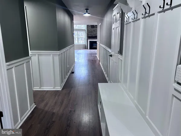 a bathroom with a toilet and a bathtub