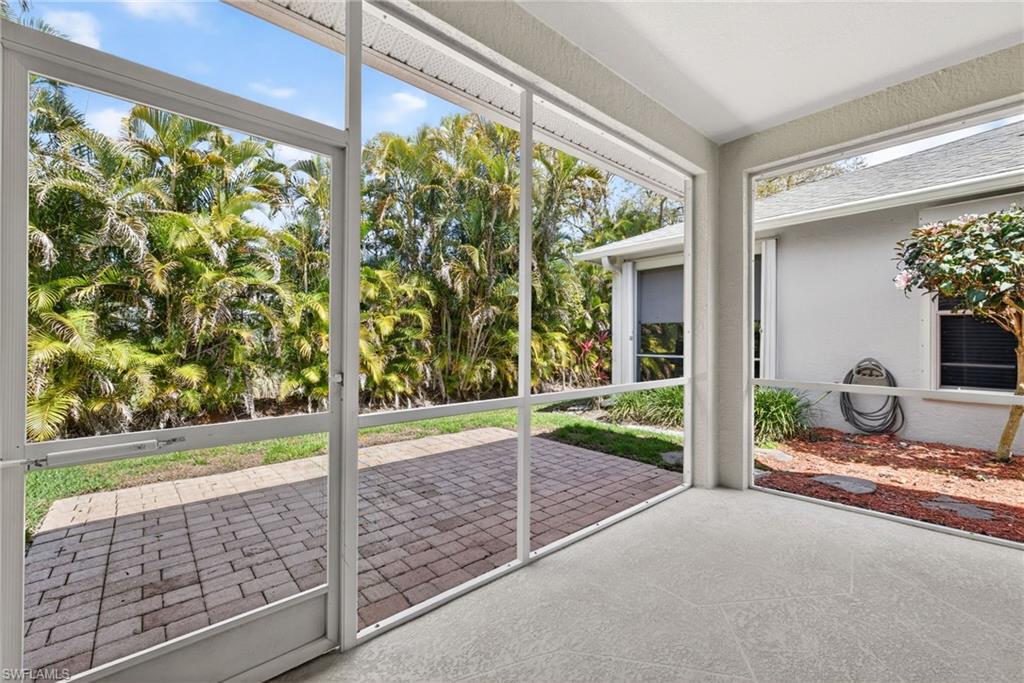 599 Crossfield Circle, Unit 35 Naples, FL 34104 - Photo 25 of 26 Unfurnished sunroom featuring plenty of natural light