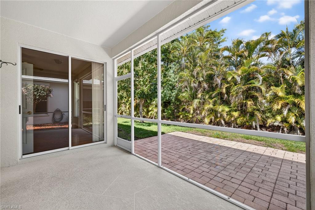 599 Crossfield Circle, Unit 35 Naples, FL 34104 - Photo 26 of 26 View of unfurnished sunroom