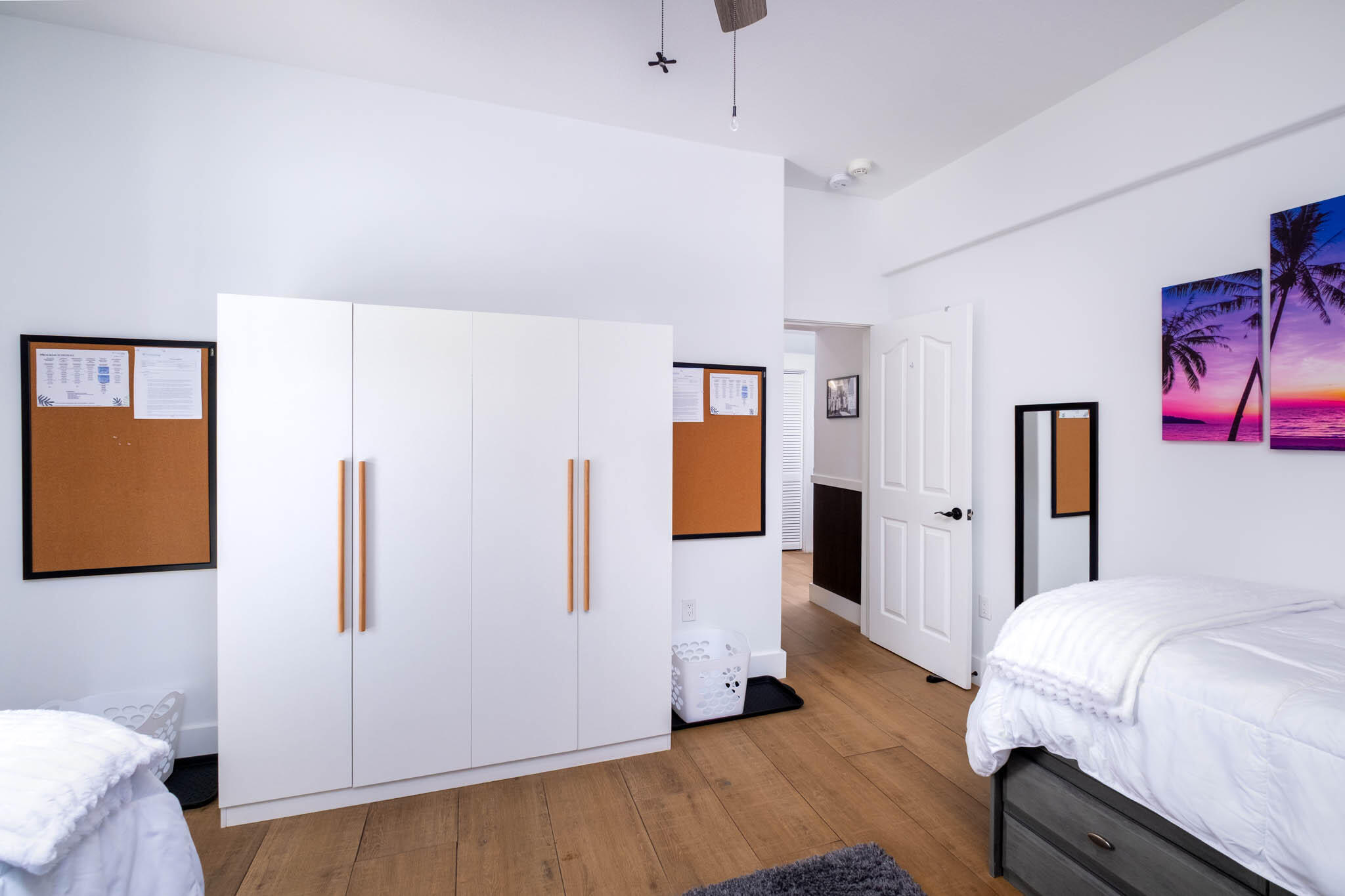 55 Ocean Front Drive Key Largo, FL 33037 - Photo 28 of 59 a spacious bedroom with a bed and a dresser