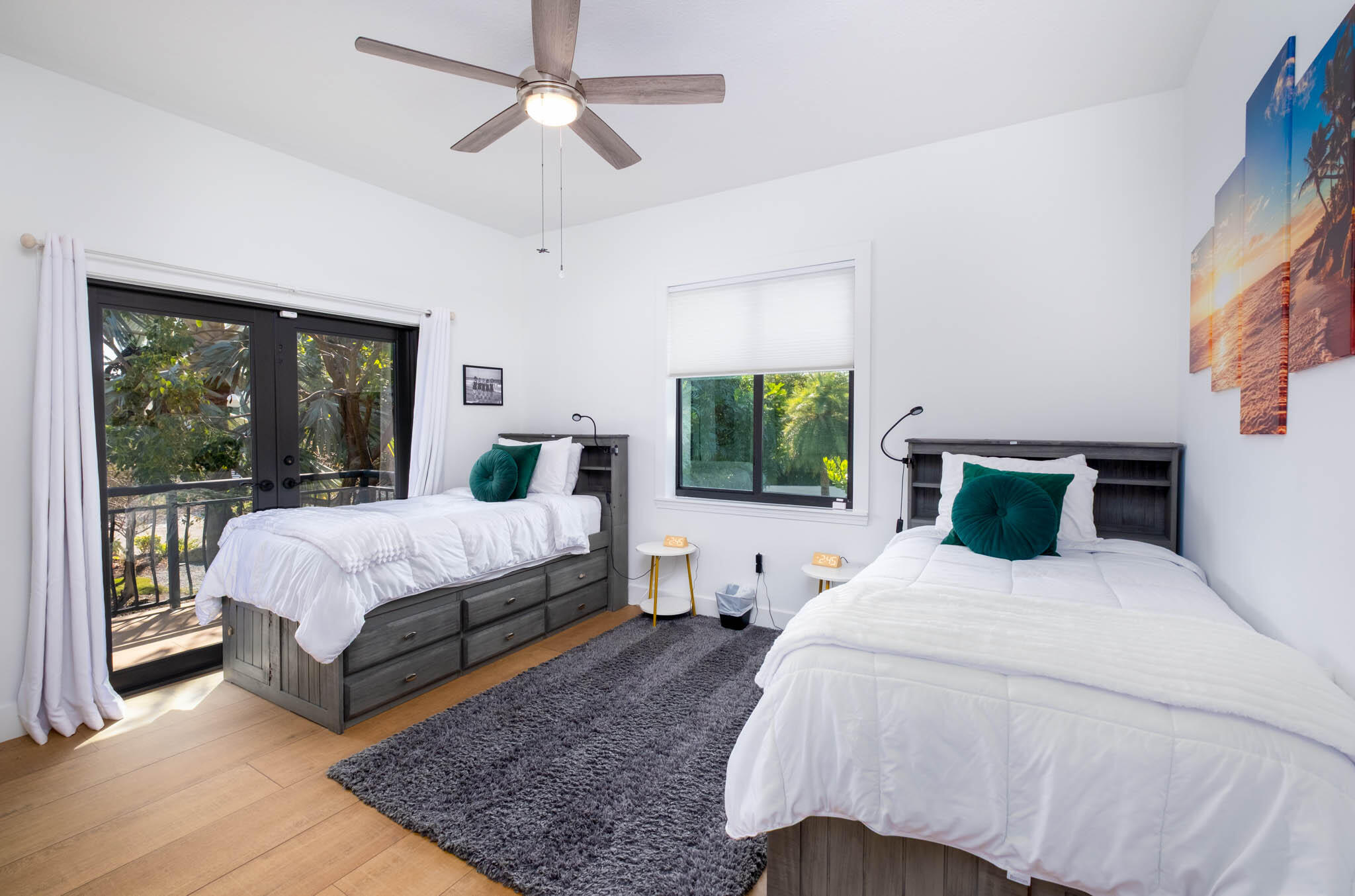 55 Ocean Front Drive Key Largo, FL 33037 - Photo 29 of 59 a bedroom with a large bed and a large window