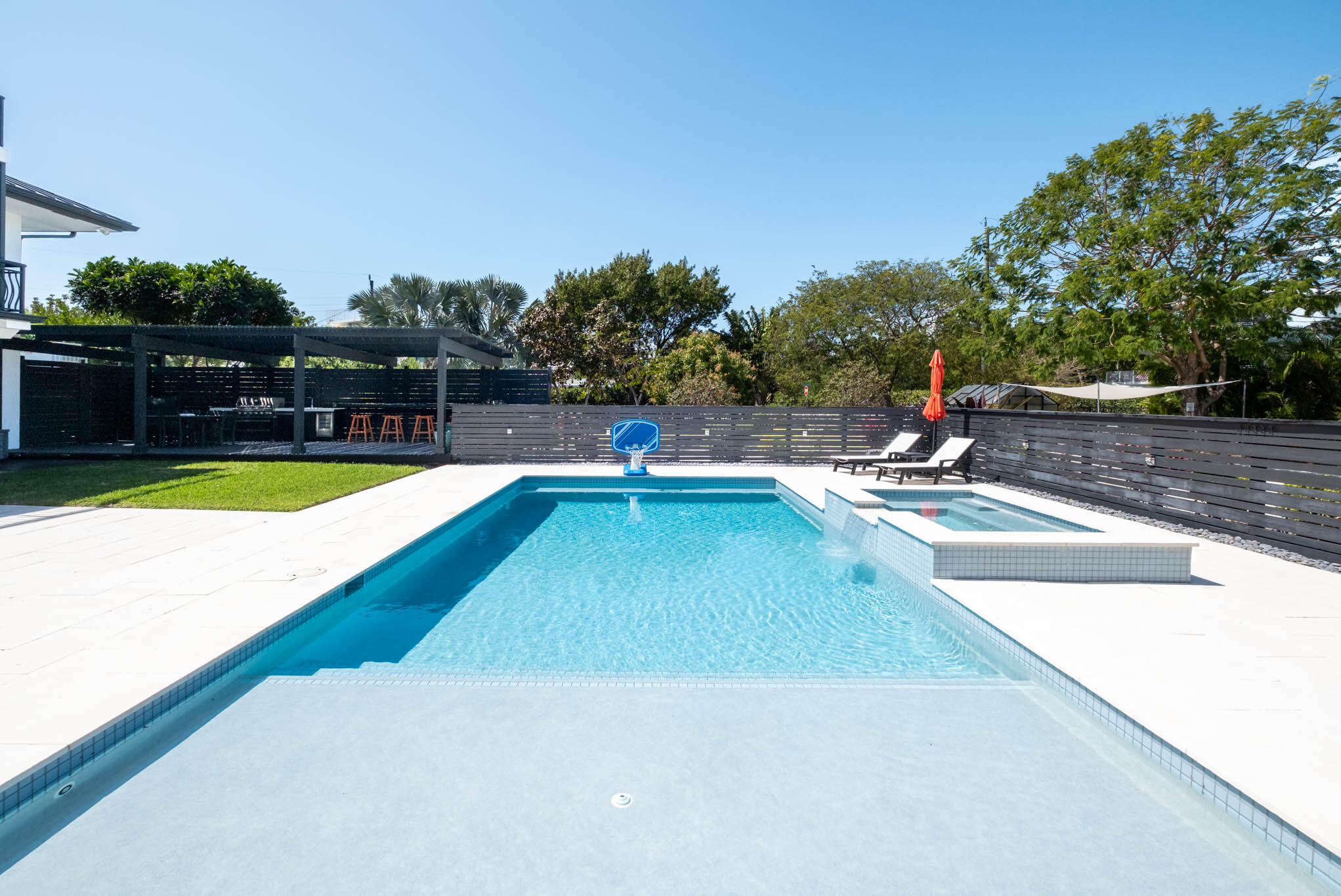 55 Ocean Front Drive Key Largo, FL 33037 - Photo 6 of 59 a view of a swimming pool with a patio
