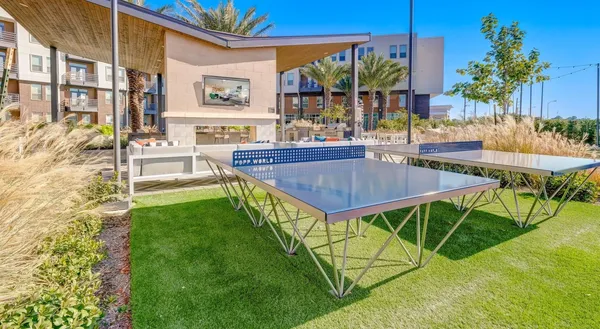 swimming pool view with a outdoor seating