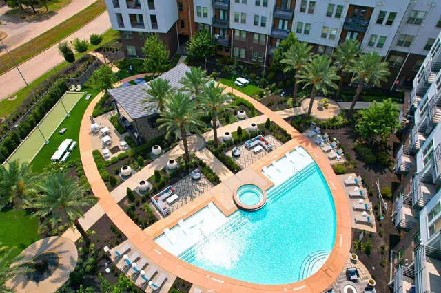 an aerial view of a house swimming pool