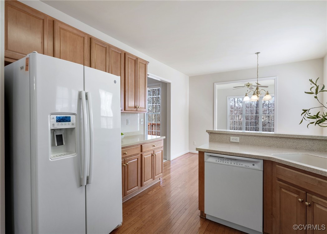 3025 Markfield Drive Midlothian, VA 23113 - Photo 17 of 41 a kitchen with stainless steel appliances a refrigerator and wooden floor