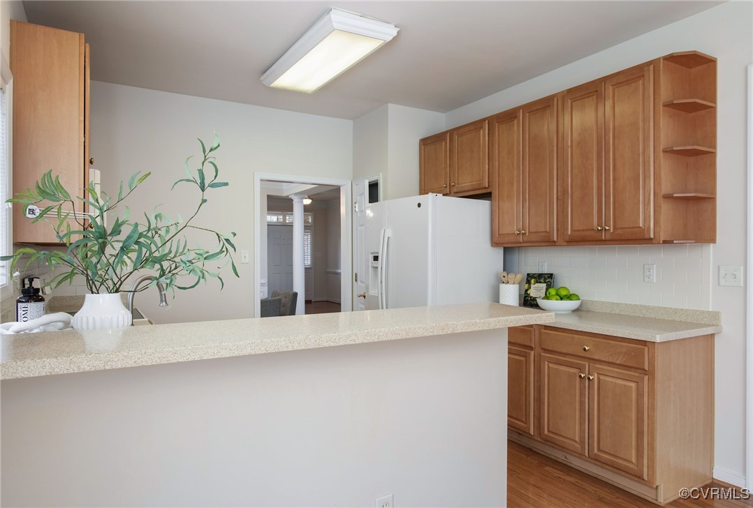 3025 Markfield Drive Midlothian, VA 23113 - Photo 19 of 41 a white kitchen with stainless steel appliances a refrigerator a sink a counter space and cabinets
