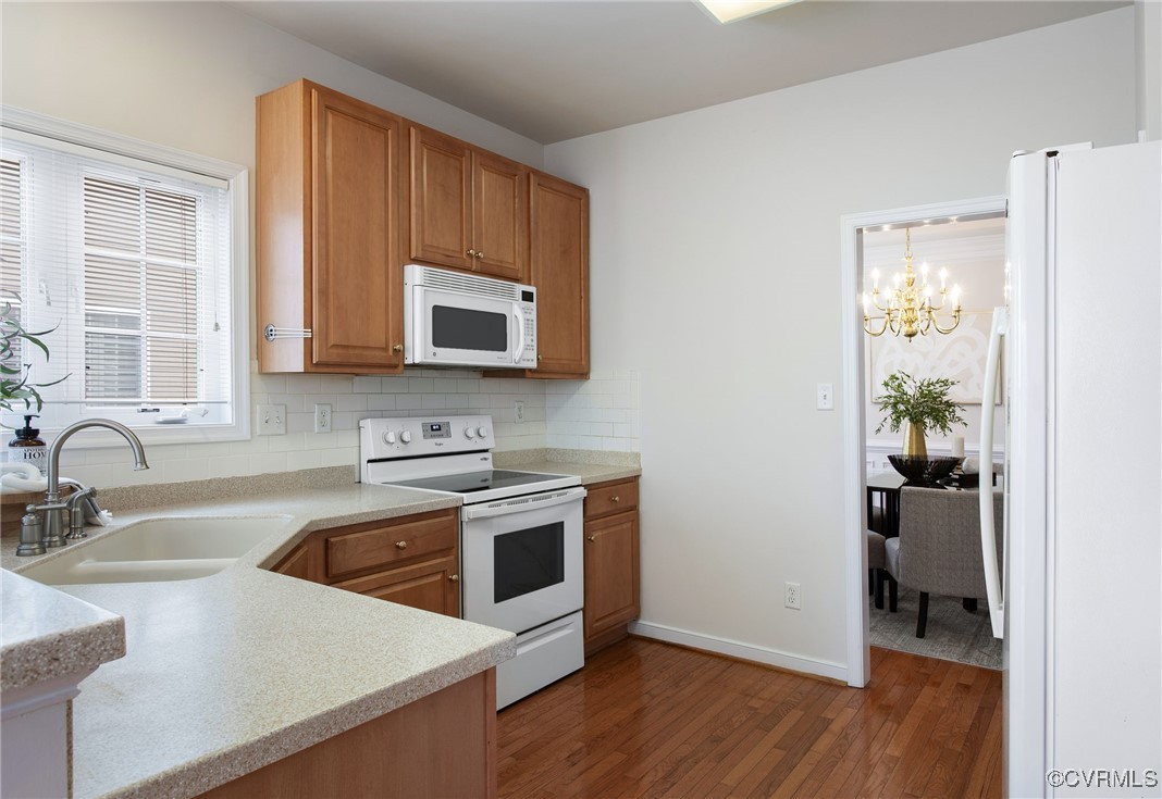 3025 Markfield Drive Midlothian, VA 23113 - Photo 20 of 41 a kitchen with a stove a microwave and sink
