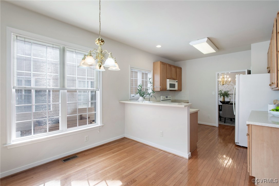 3025 Markfield Drive Midlothian, VA 23113 - Photo 22 of 41 a kitchen with a refrigerator and a stove top oven