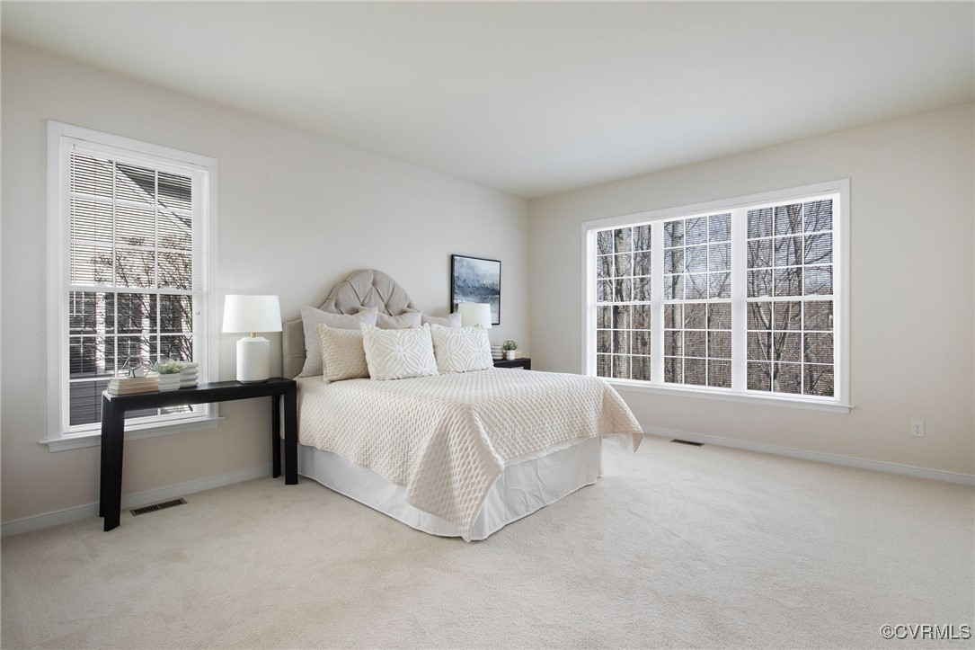 3025 Markfield Drive Midlothian, VA 23113 - Photo 25 of 41 a spacious bedroom with a bed and a large window