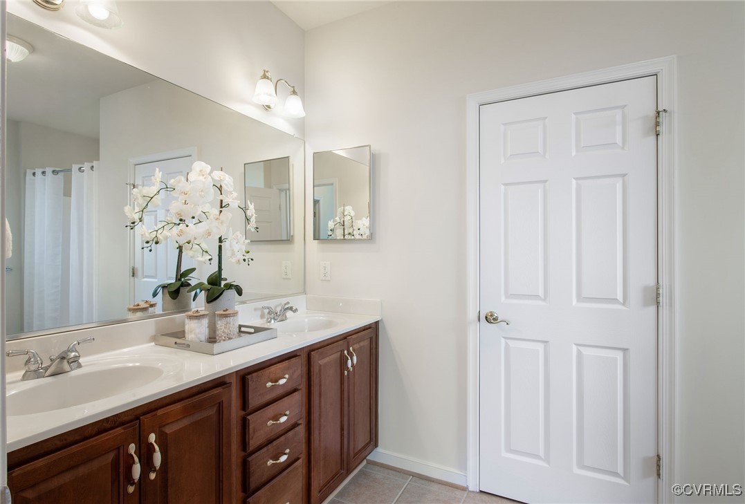 3025 Markfield Drive Midlothian, VA 23113 - Photo 28 of 41 a bathroom with a double vanity sink and a mirror