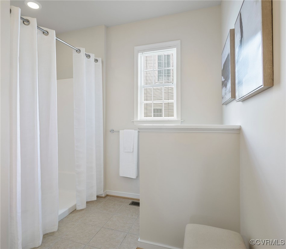 3025 Markfield Drive Midlothian, VA 23113 - Photo 29 of 41 a bathroom with a shower curtain