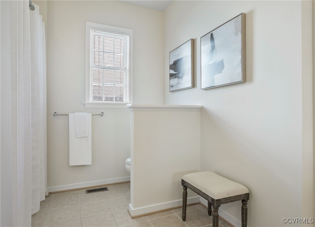 3025 Markfield Drive Midlothian, VA 23113 - Photo 30 of 41 a view of a hallway with front door and wooden floor