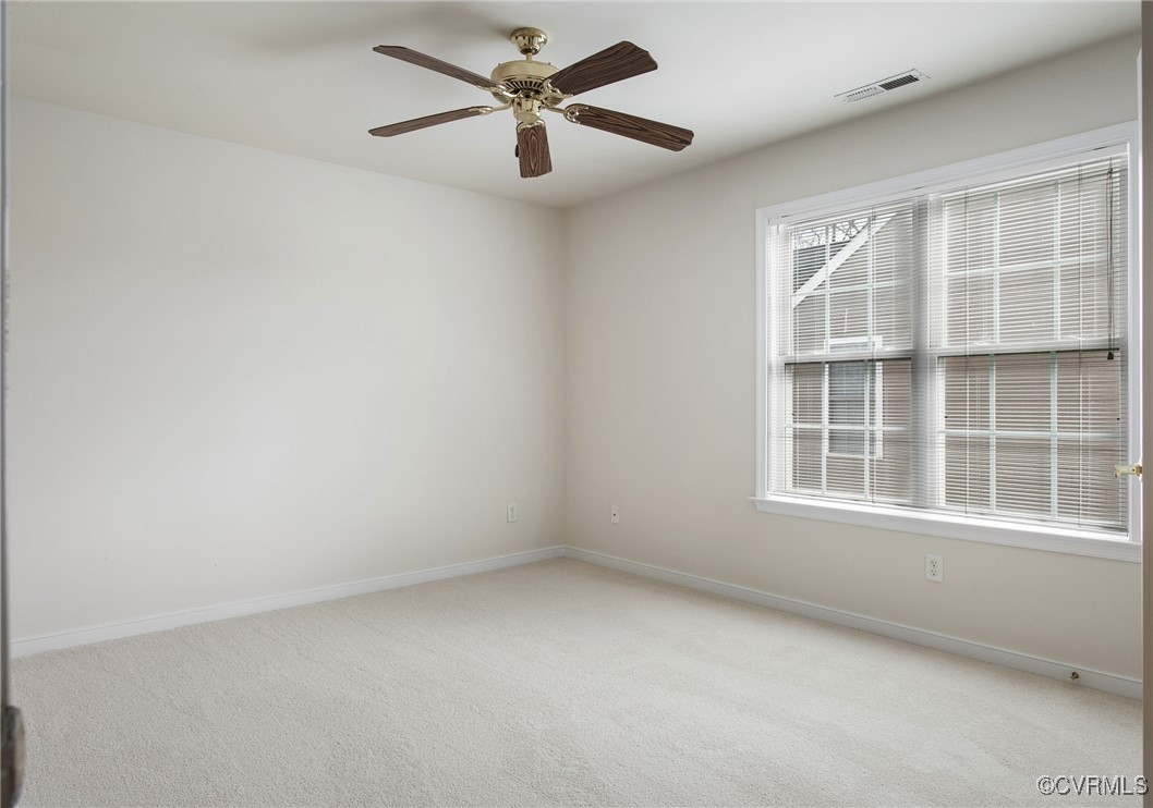 3025 Markfield Drive Midlothian, VA 23113 - Photo 34 of 41 an empty room with a window and a fan