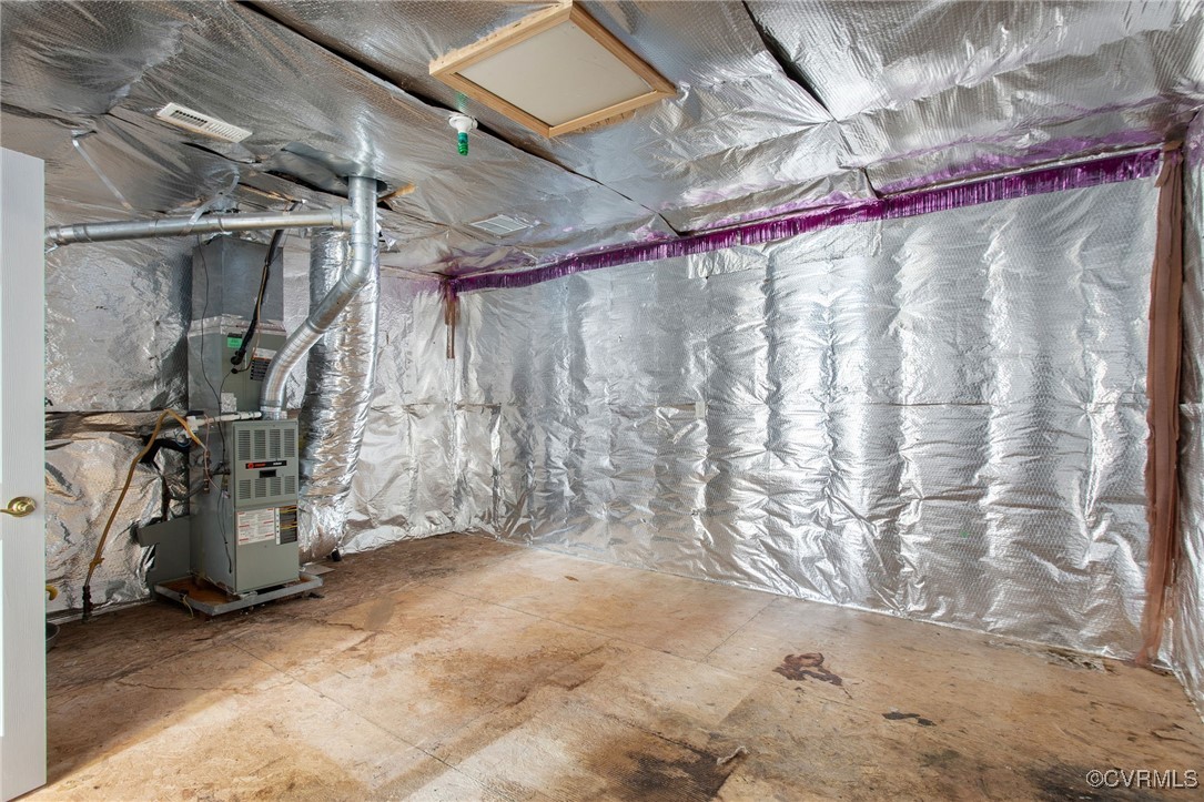 3025 Markfield Drive Midlothian, VA 23113 - Photo 35 of 41 a view of walk in closet with clothes and shoes
