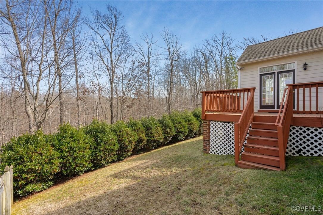 3025 Markfield Drive Midlothian, VA 23113 - Photo 39 of 41 a backyard of a house with table and chairs