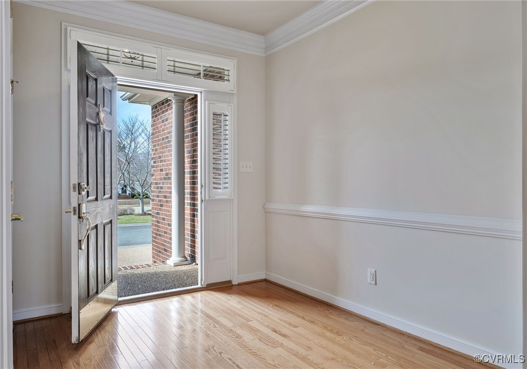 3025 Markfield Drive Midlothian, VA 23113 - Photo 6 of 41 a view of an empty room with wooden floor and a window