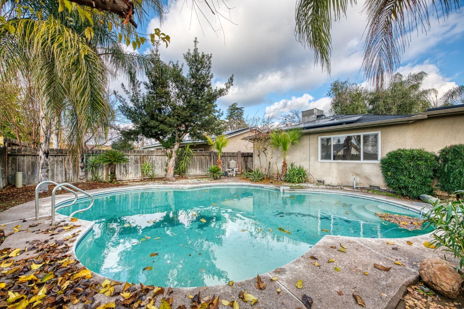 2866 Caesar Avenue Clovis, CA 93612 - Photo 32 of 45 a view of a house with pool and sitting area