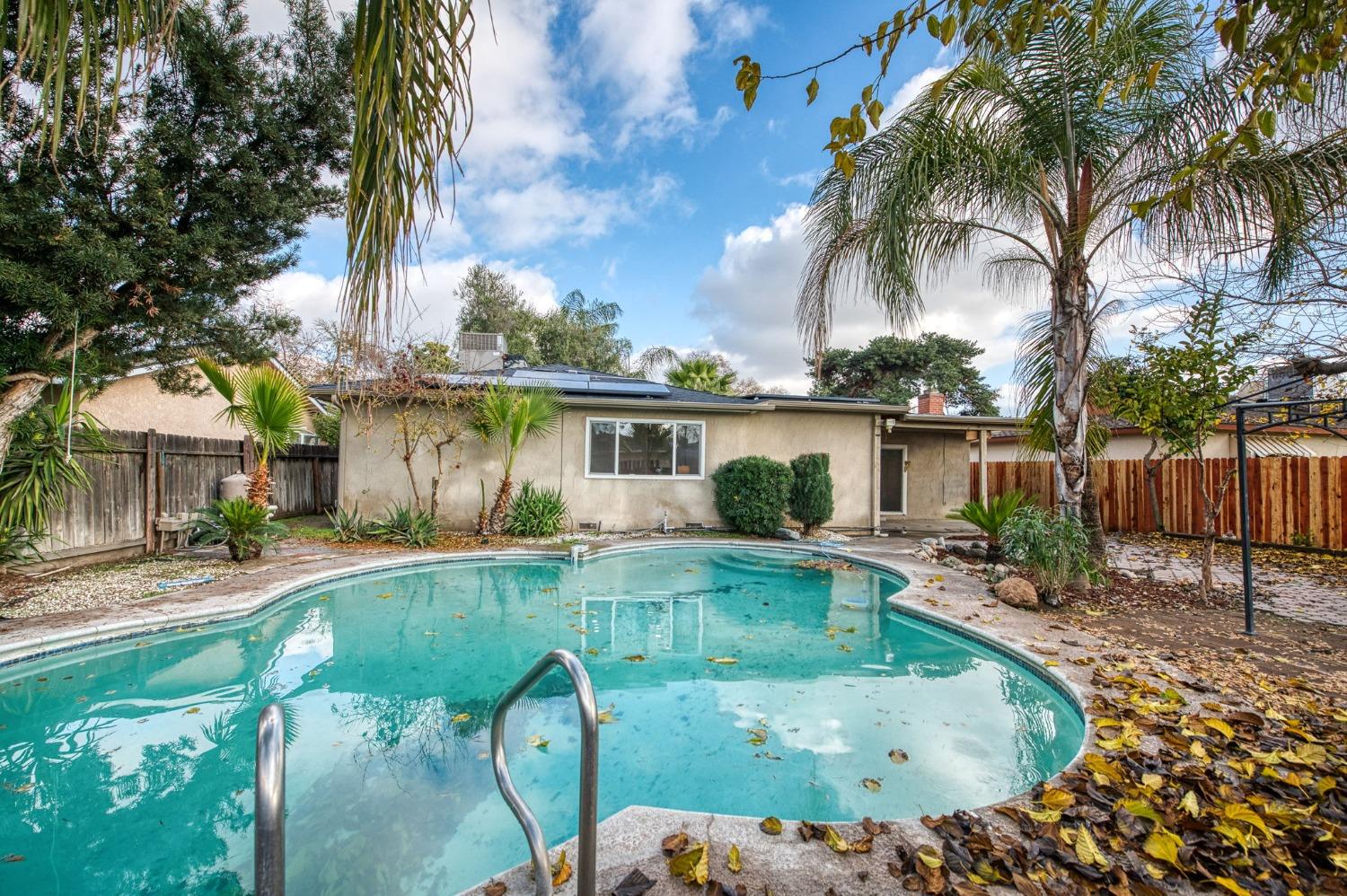 2866 Caesar Avenue Clovis, CA 93612 - Photo 33 of 45 front view of house with a yard and potted plants