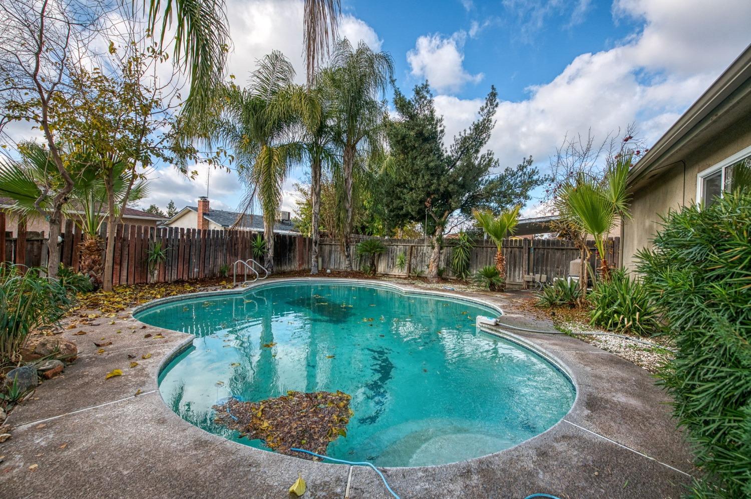2866 Caesar Avenue Clovis, CA 93612 - Photo 36 of 45 a view of a swimming pool with a patio
