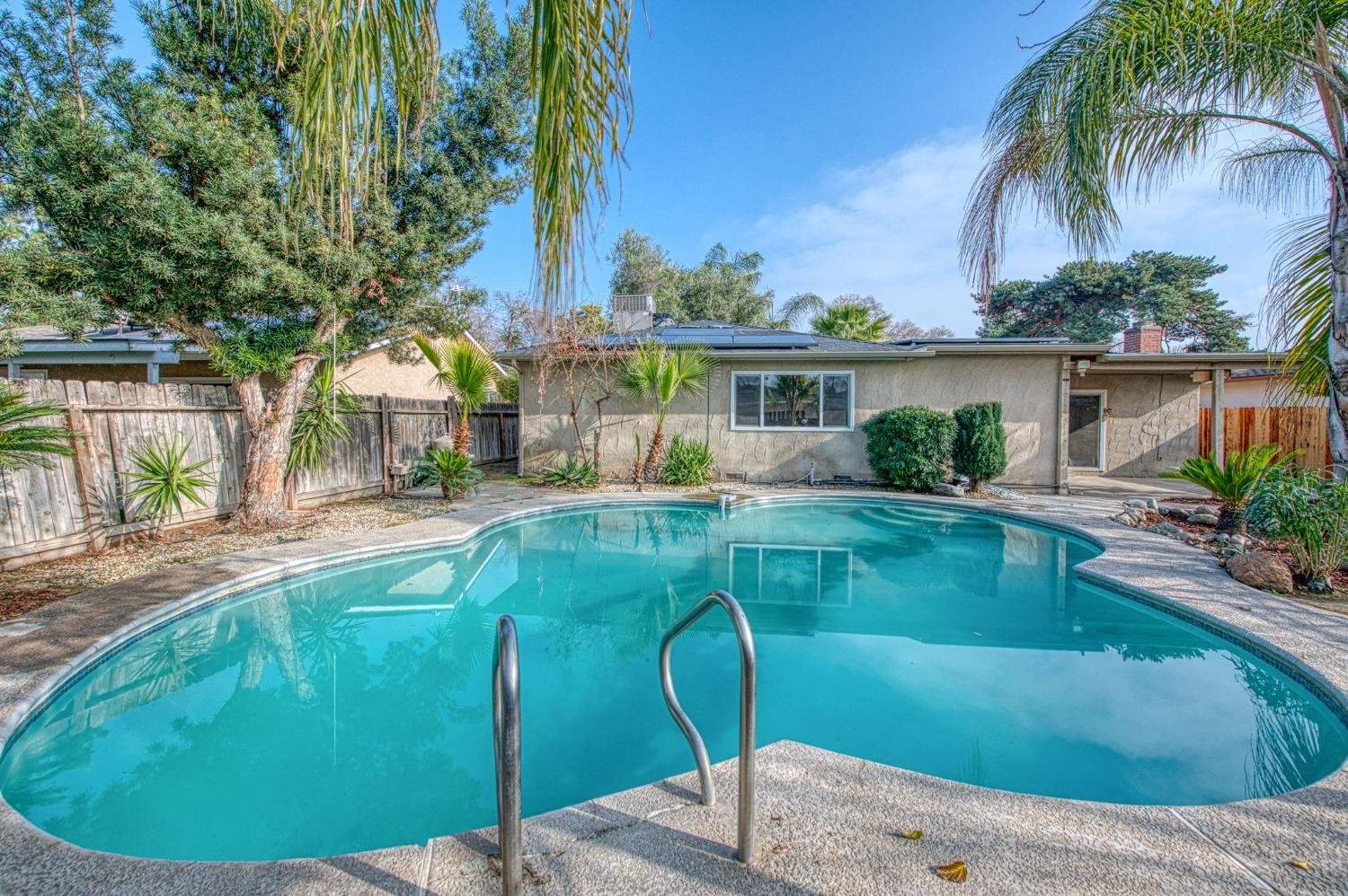 2866 Caesar Avenue Clovis, CA 93612 - Photo 41 of 45 a view of house with swimming pool outdoor seating