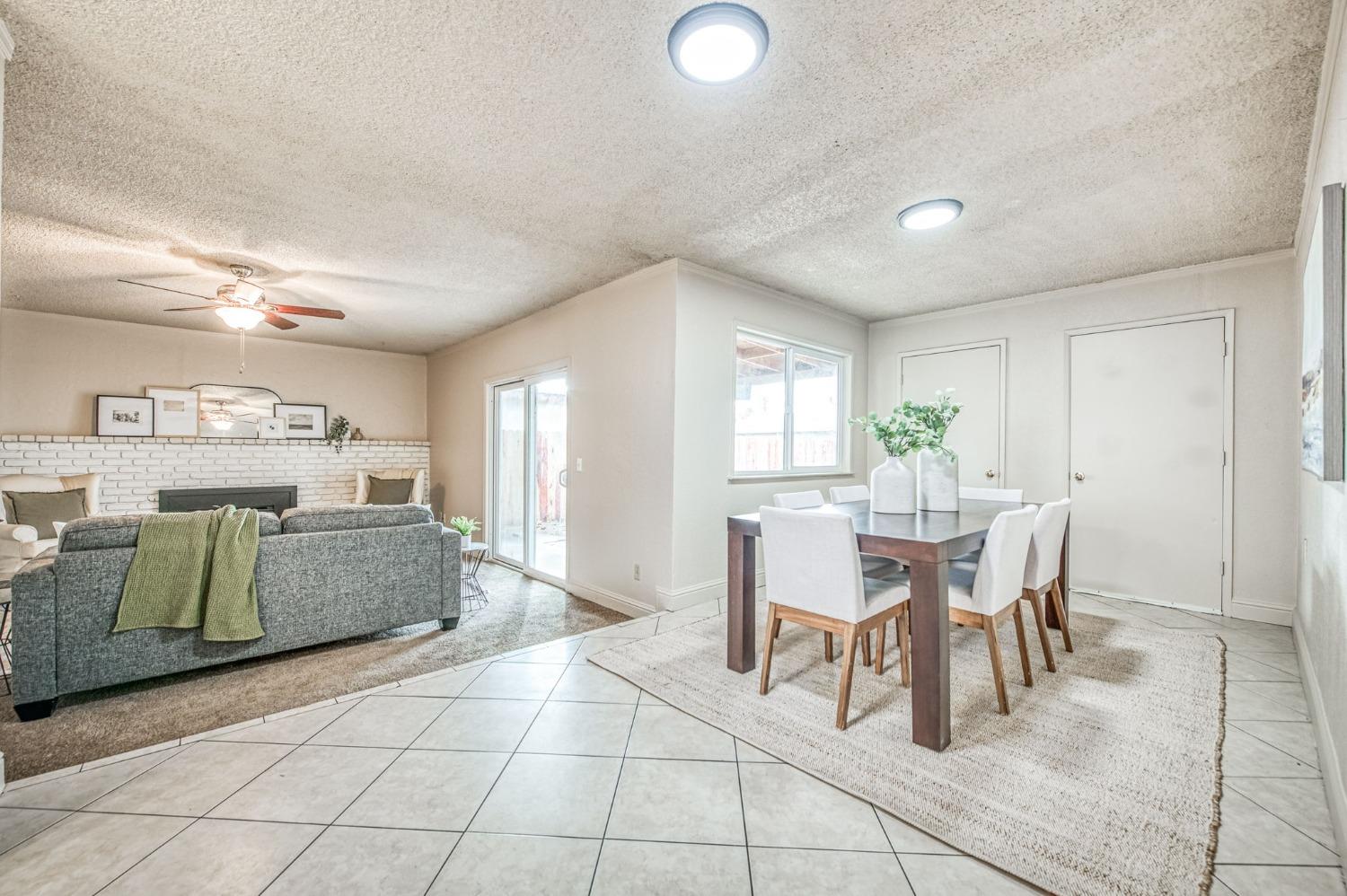 2866 Caesar Avenue Clovis, CA 93612 - Photo 9 of 45 a dining room with furniture and window