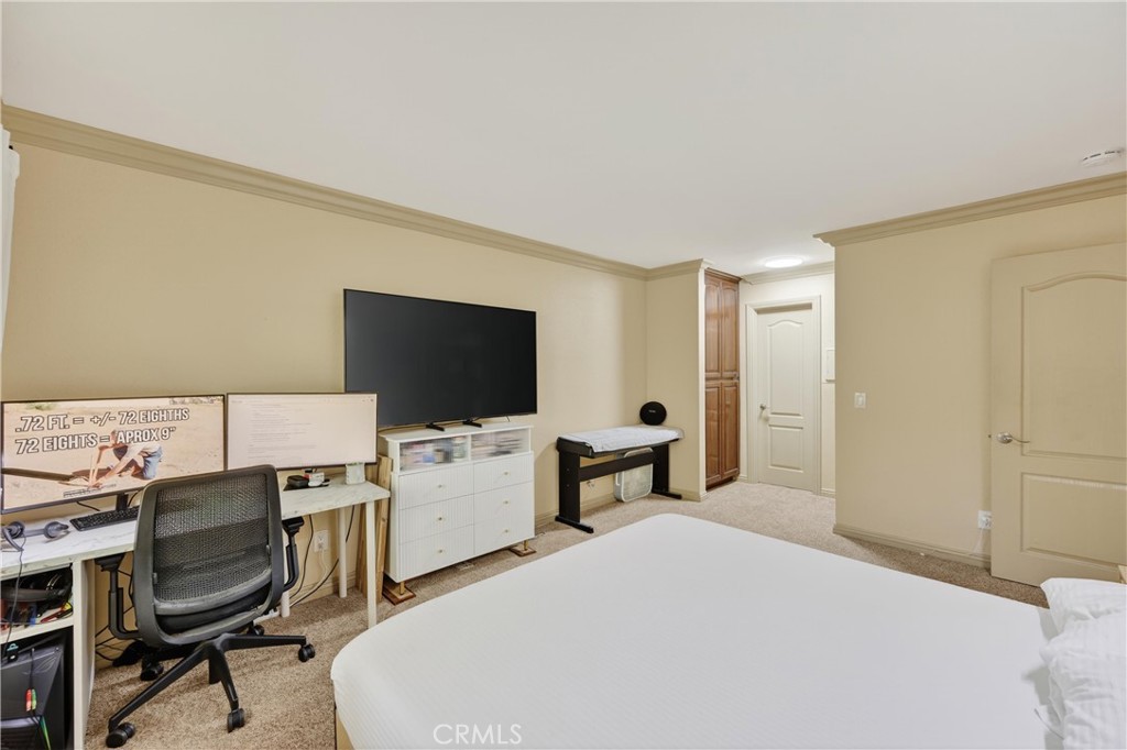 3535 Banbury Drive, Unit 14 Riverside, CA 92505 - Photo 11 of 26 a bedroom with a workspace