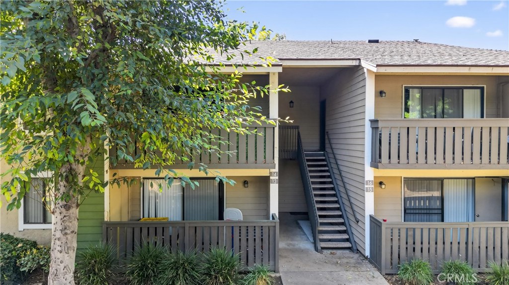3535 Banbury Drive, Unit 14 Riverside, CA 92505 - Photo 19 of 26 a view of a house with a small yard