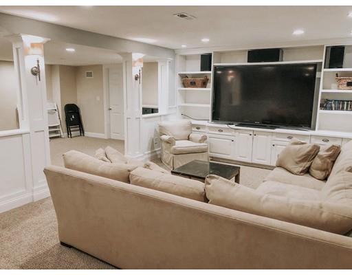 265 Sargent Road Boxborough, MA 01719 - Photo 11 of 15 a living room with furniture and a flat screen tv
