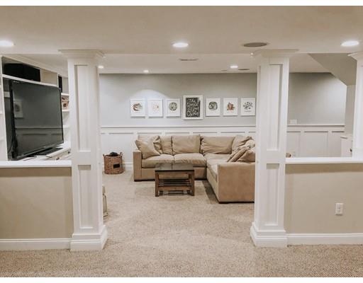265 Sargent Road Boxborough, MA 01719 - Photo 12 of 15 a living room with furniture and a flat screen tv