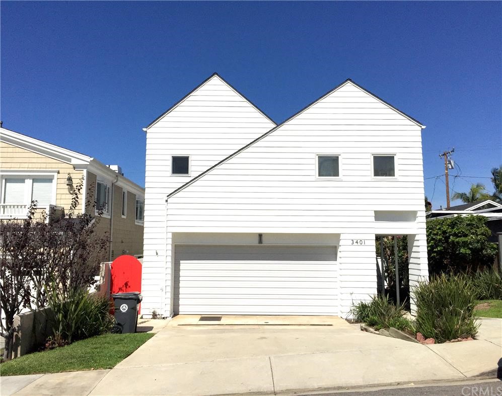 3401 Pine Avenue Manhattan Beach, CA 90266 - Photo 1 of 24 a view of a white house with a small yard and plants